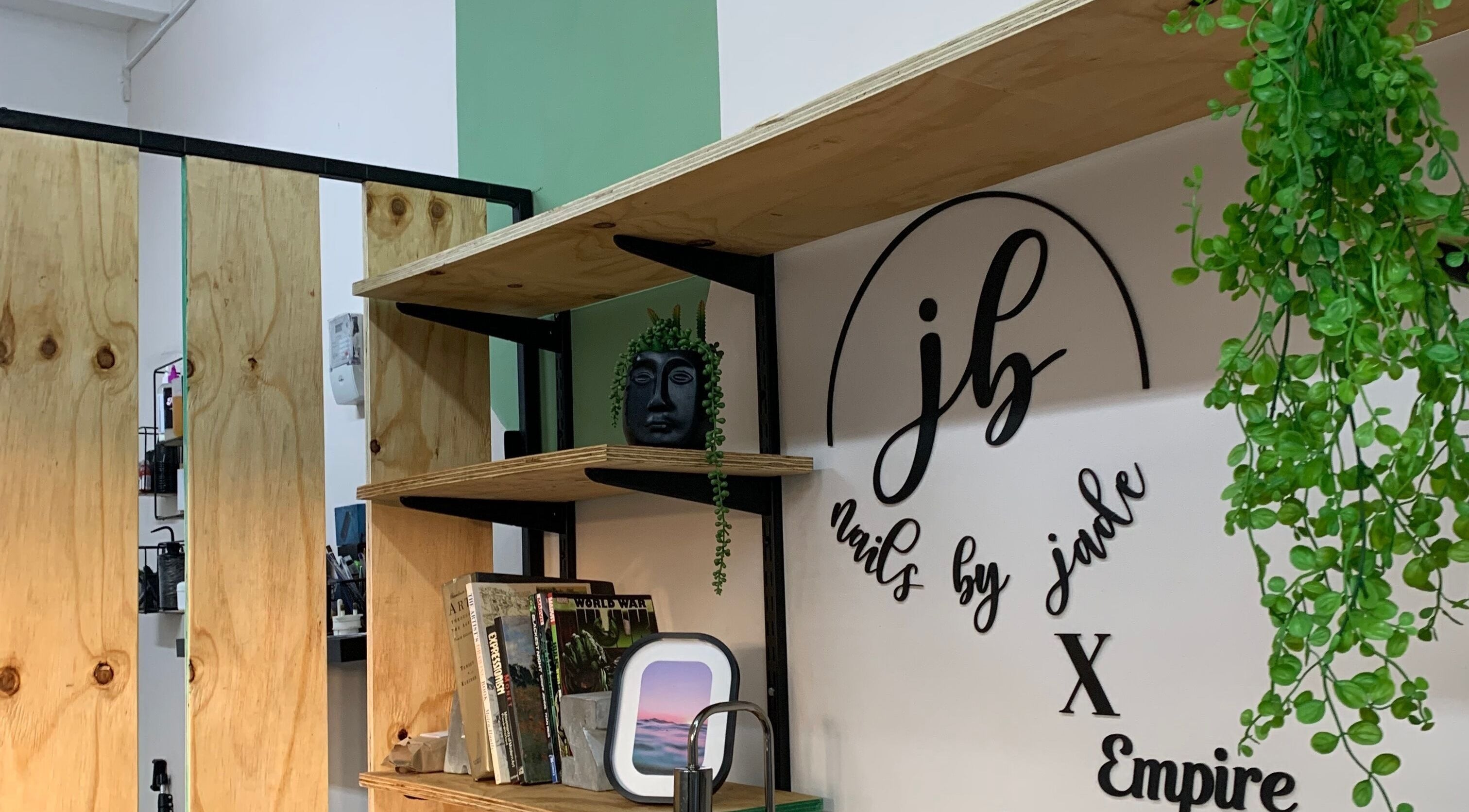 Nails By Jade in Pietermaritzburg features lush greenery and chic decor for a welcoming atmosphere.