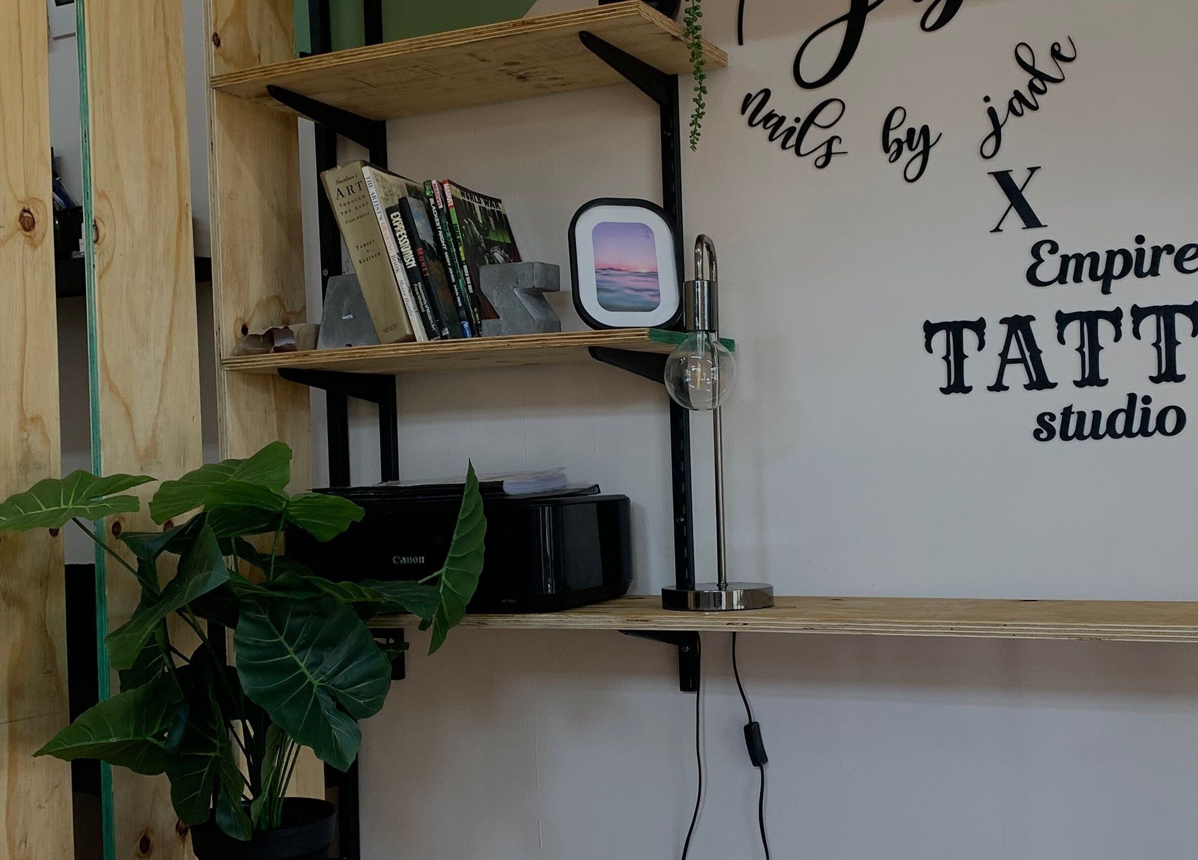 Stylish decor at Nails By Jade, Pietermaritzburg, Kwazulu-natal, ZA with shelf and greenery.