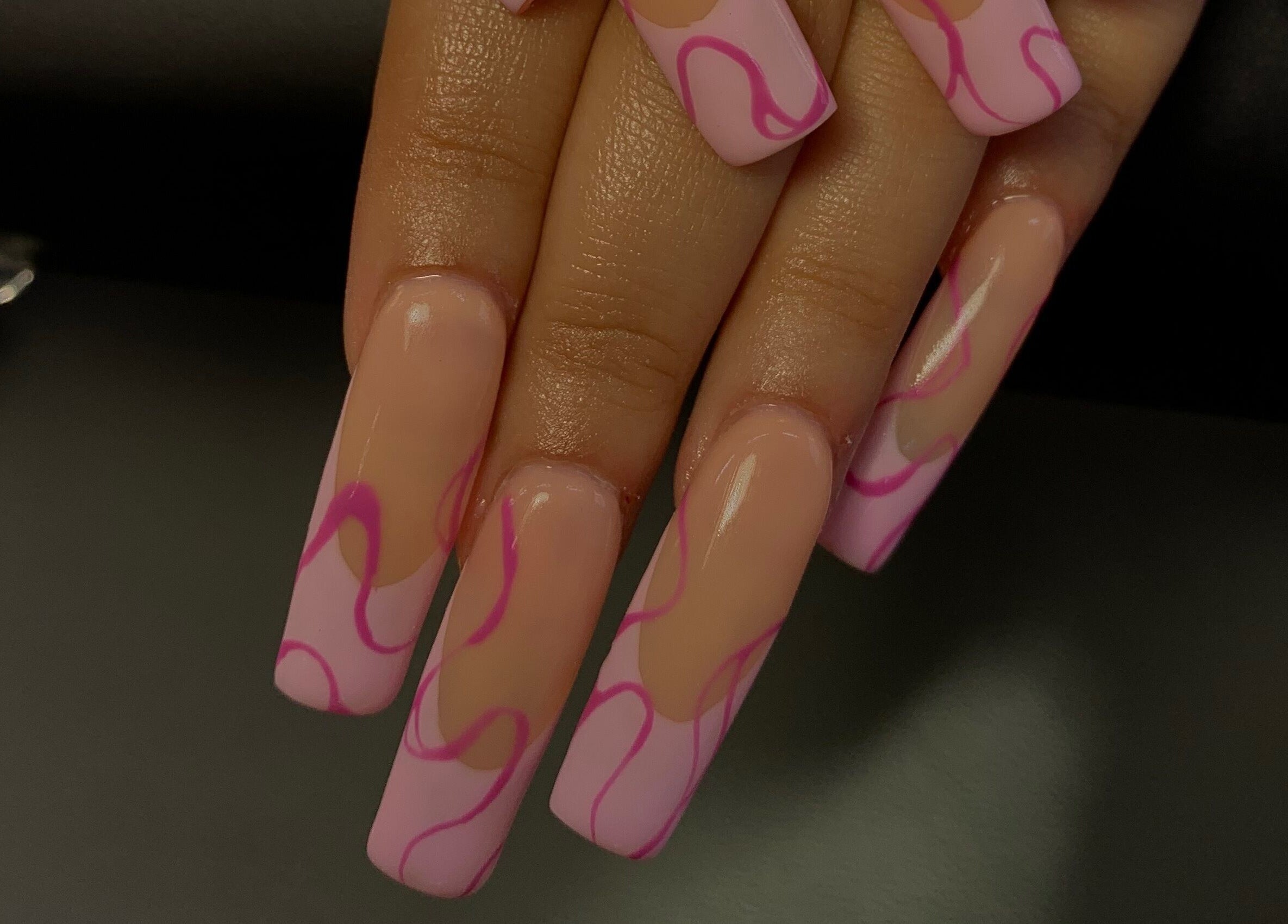 Elegant pink swirl nail art at Nails By Jade, Pietermaritzburg, Kwazulu-natal, ZA, showcasing stylish design.