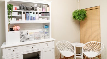Sophisticated skincare display and seating at Dr. Jeanine Cronje Aesthetics in Pretoria, Gauteng, ZA.