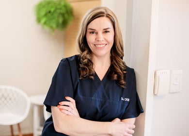 Dr. Jeanine Cronje smiling at her Pretoria, Gauteng, ZA aesthetics clinic.