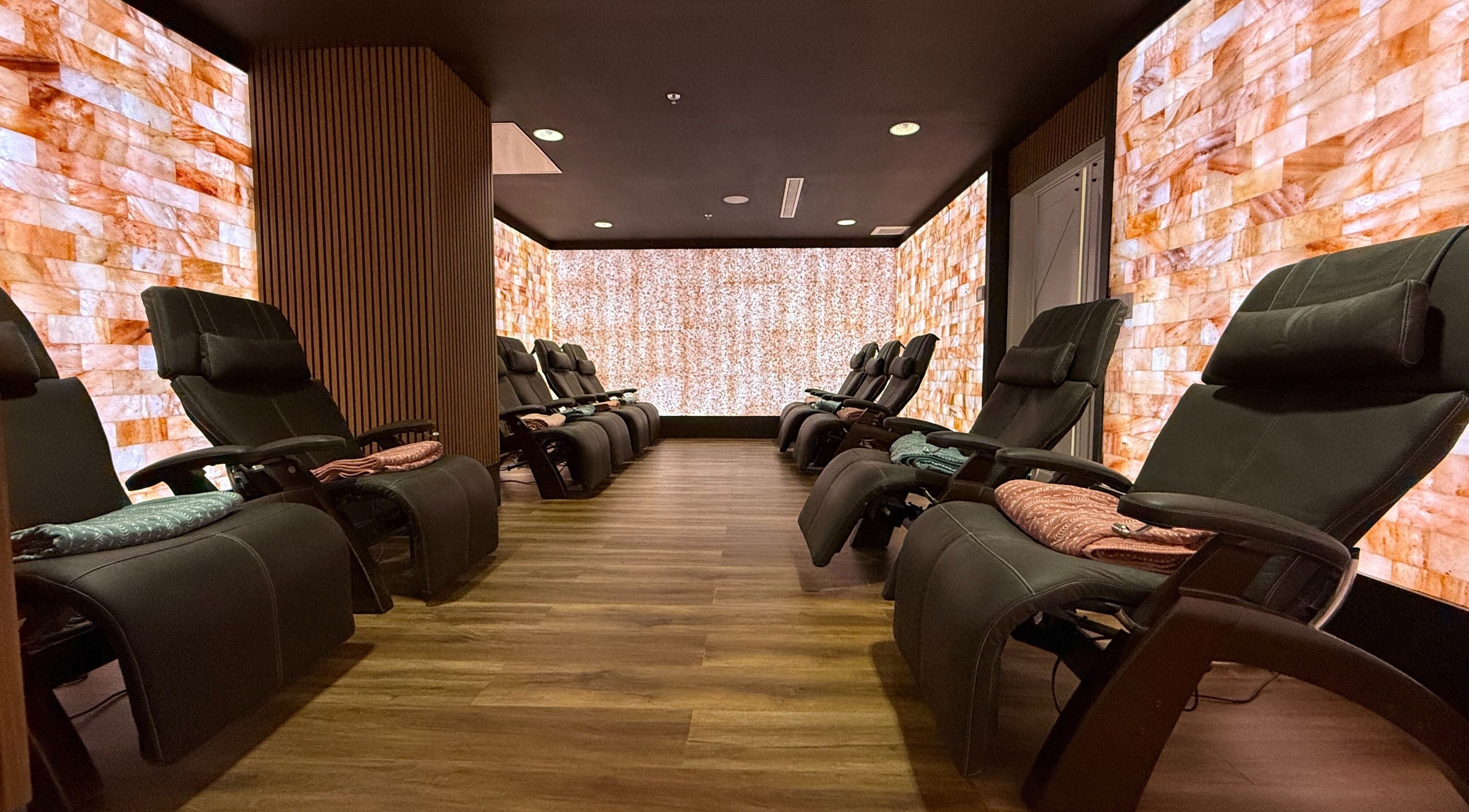 Relaxing chairs in salt-lined room at Sapa Wellness Workshops - Sound Bath and Reiki Healing, Denver, Colorado, US.