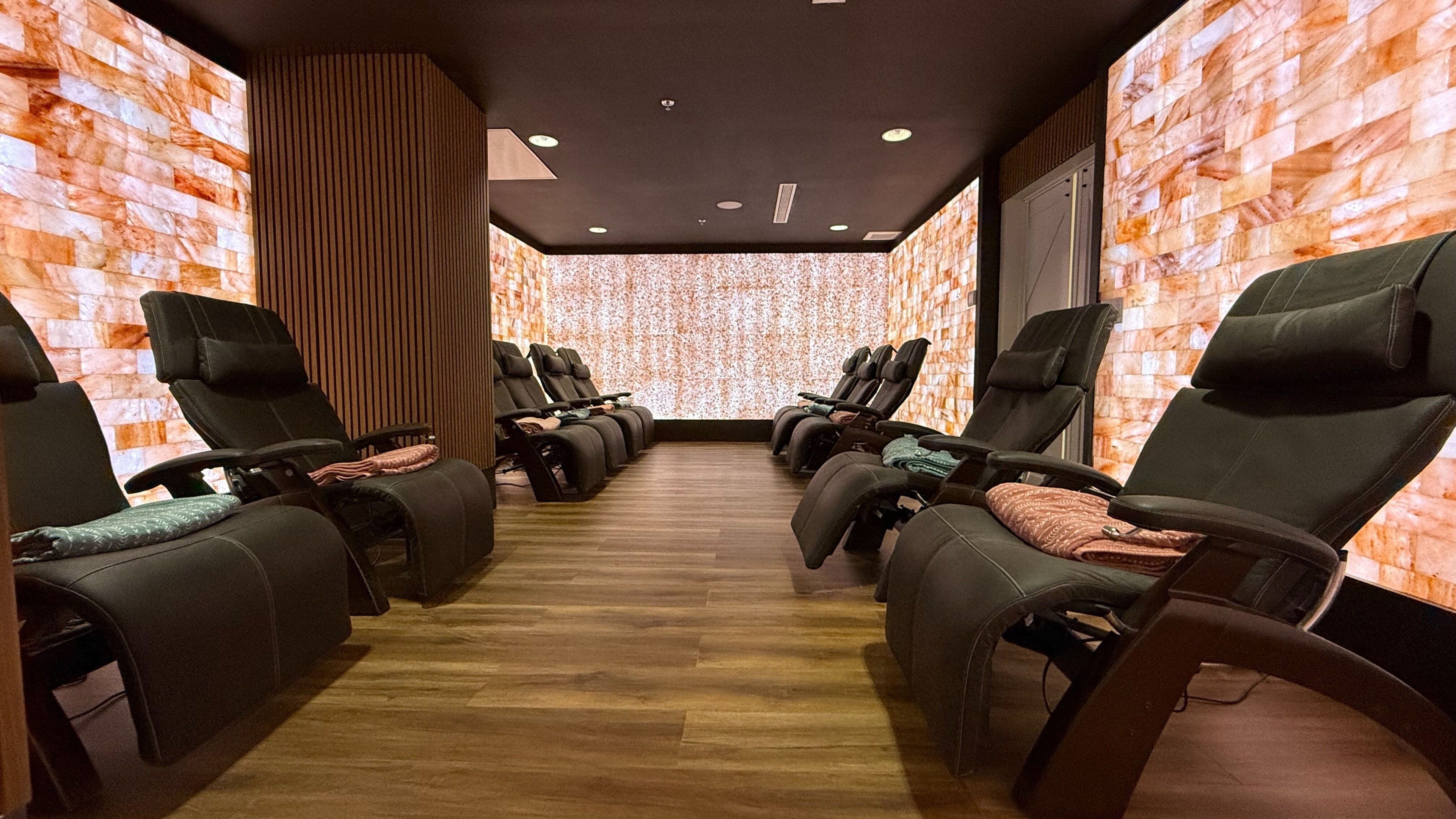 Relaxing chairs in salt-lined room at Sapa Wellness Workshops - Sound Bath and Reiki Healing, Denver, Colorado, US.