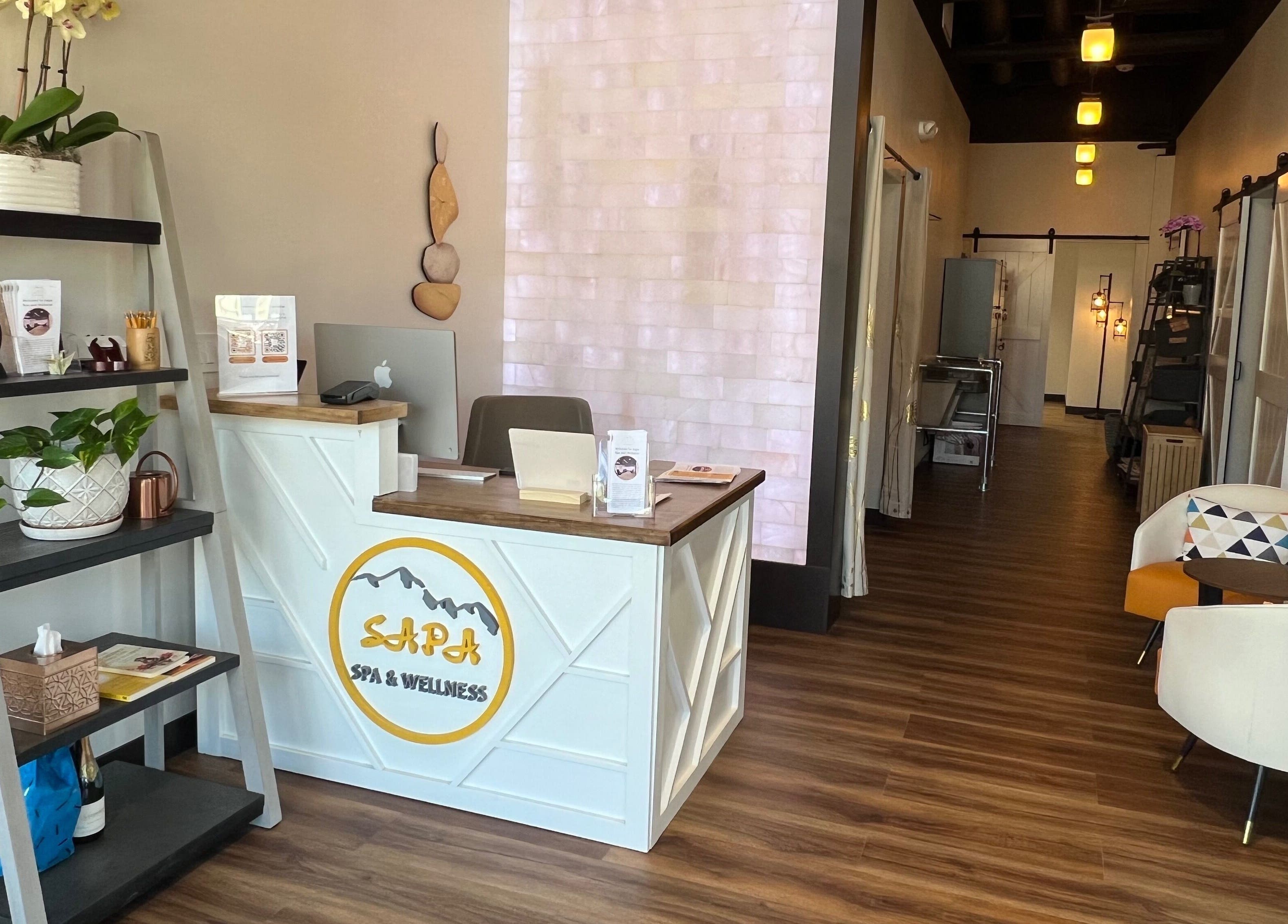 Sapa Spa and Wellness lobby with wood floors, modern decor in Denver, Colorado, US.