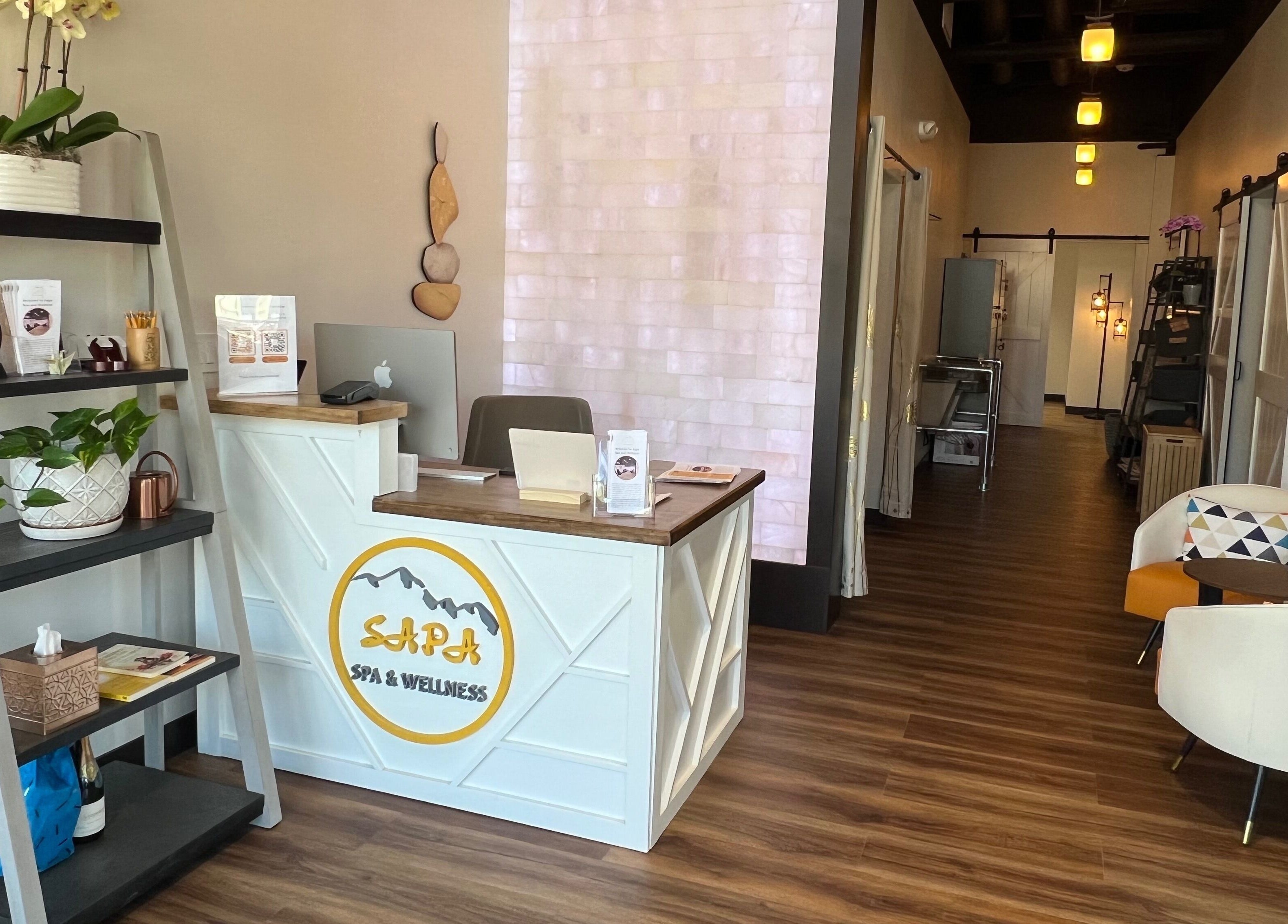 Sapa Spa and Wellness lobby with wood floors, modern decor in Denver, Colorado, US.