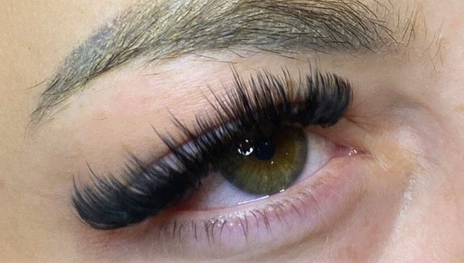 Close-up of elegant eyelash extensions at By Loretta Monet, Morley, England, GB. Highlighting beauty services.
