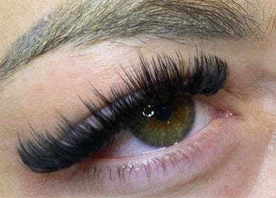 Close-up of elegant eyelash extensions at By Loretta Monet, Morley, England, GB. Highlighting beauty services.