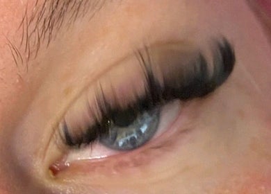 Close-up of expertly crafted eyelash extensions at By Loretta Monet, Morley, England, GB.