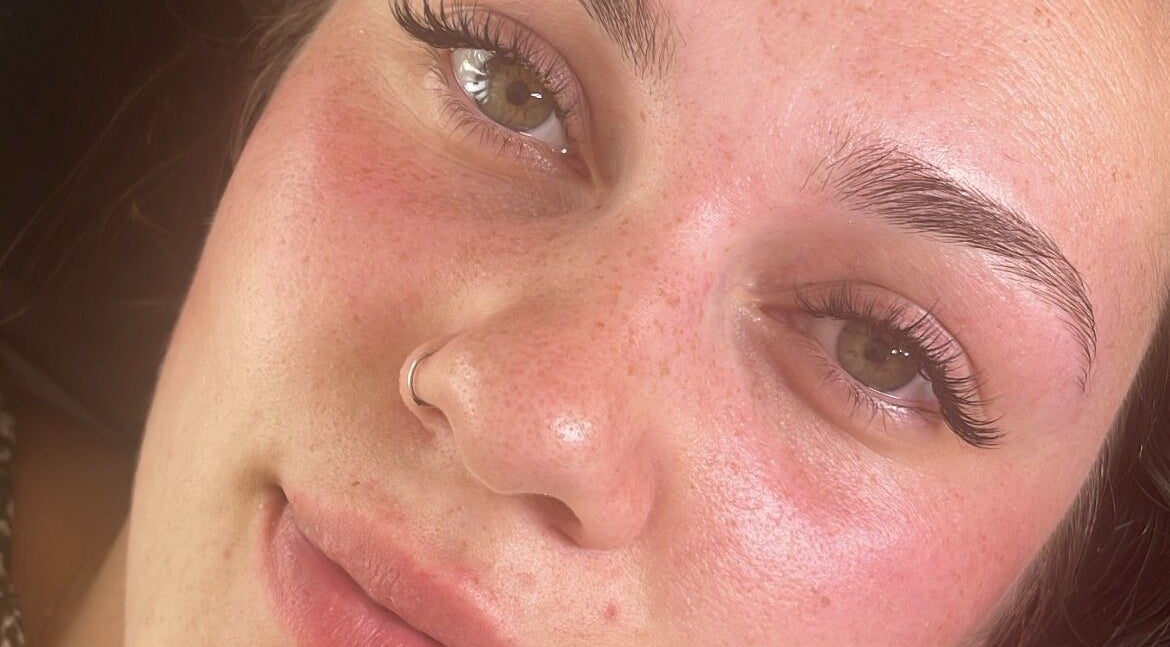 Close-up of a woman's radiant face after treatment at The Beauty Shed, Blunsdon Saint Andrew, England, GB.