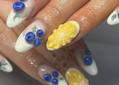 Vibrant nail art with fruit design by Nails by Kara May, Bridport, England, GB.
