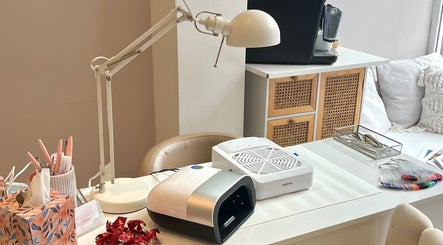 Modern nail station setup at Polished by Jasmin in Worcester, England, GB with sleek tools and comfortable seating.