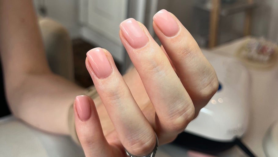 Elegant pink manicure at Polished by Jasmin in Worcester, England, GB. Perfectly polished and shiny nails.