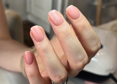 Elegant pink manicure at Polished by Jasmin in Worcester, England, GB. Perfectly polished and shiny nails.