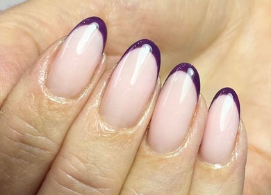 Elegant purple-tipped manicure at Polished by Jasmin, Worcester, England, GB, showcasing nail artistry.
