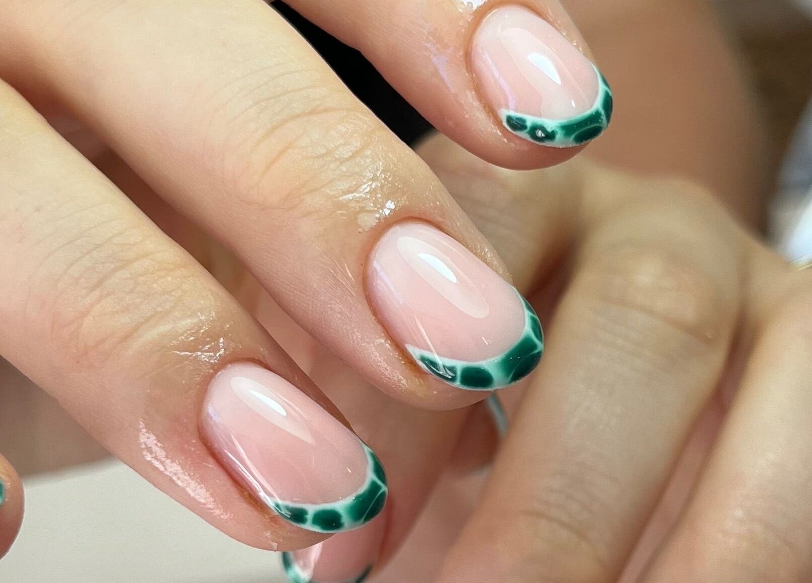 Stylish green French manicure at Polished by Jasmin, Worcester, England, GB.