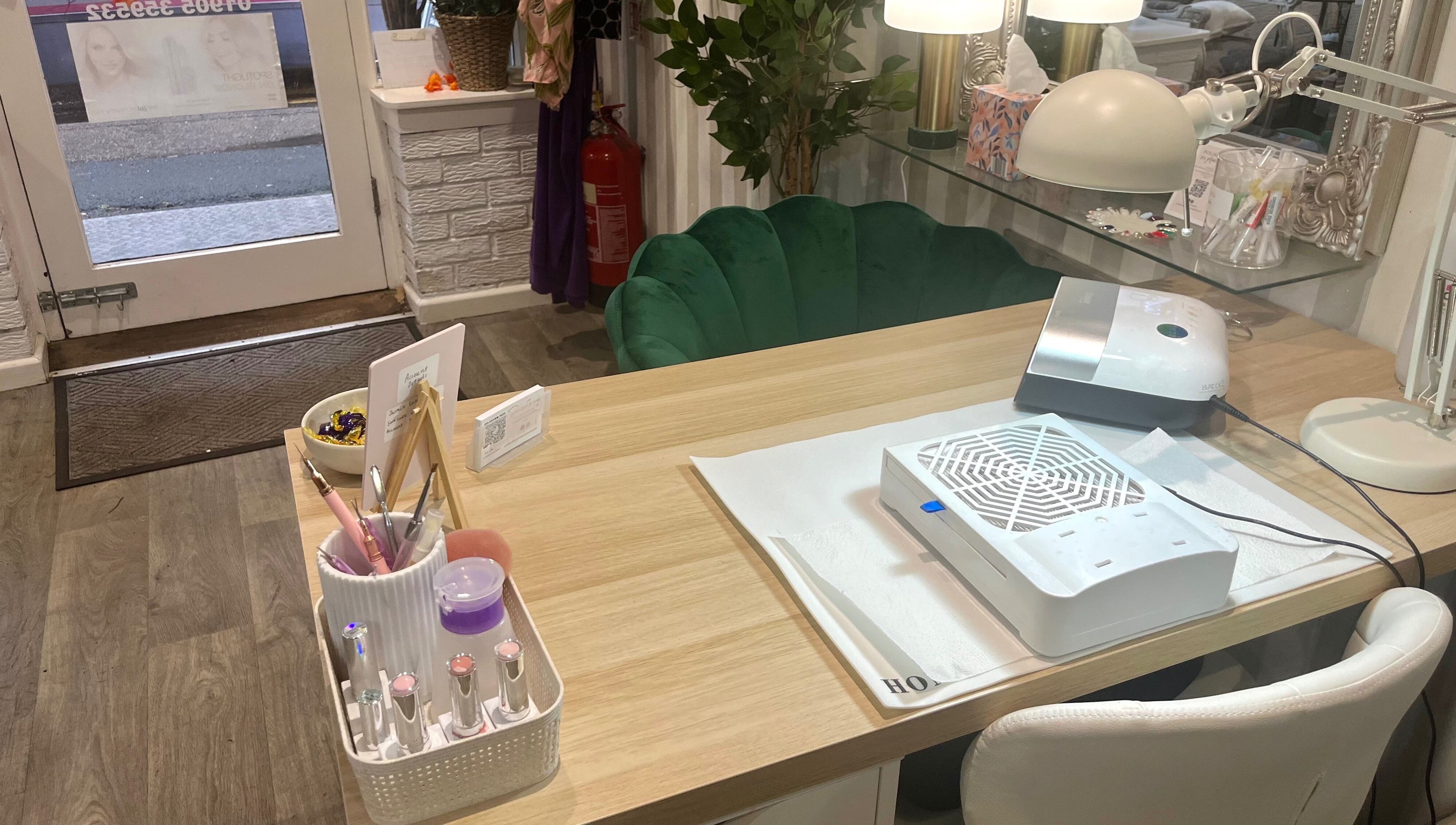 Nail station at Polished by Jasmin, Worcester, England, GB, featuring modern tools and decor.