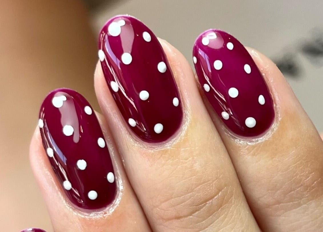 Elegant polka dot nails design at Polished by Jasmin, Worcester, England, GB.
