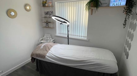 Treatment room at Julia Plas Skin (Home based), Stoke-on-Trent, England, GB with bed, lighting, and decor.