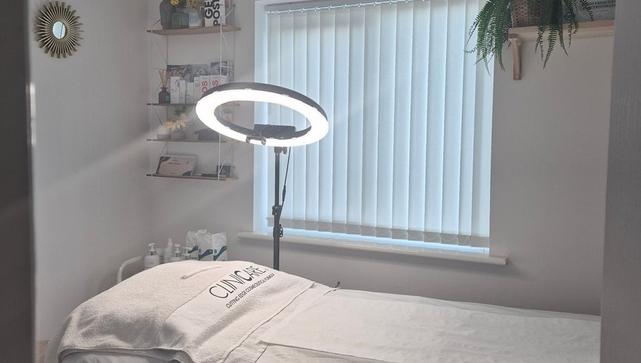 Therapy room at Julia Plas Skin Alsager, Stoke-on-Trent, England, featuring treatment bed and ambient lighting.