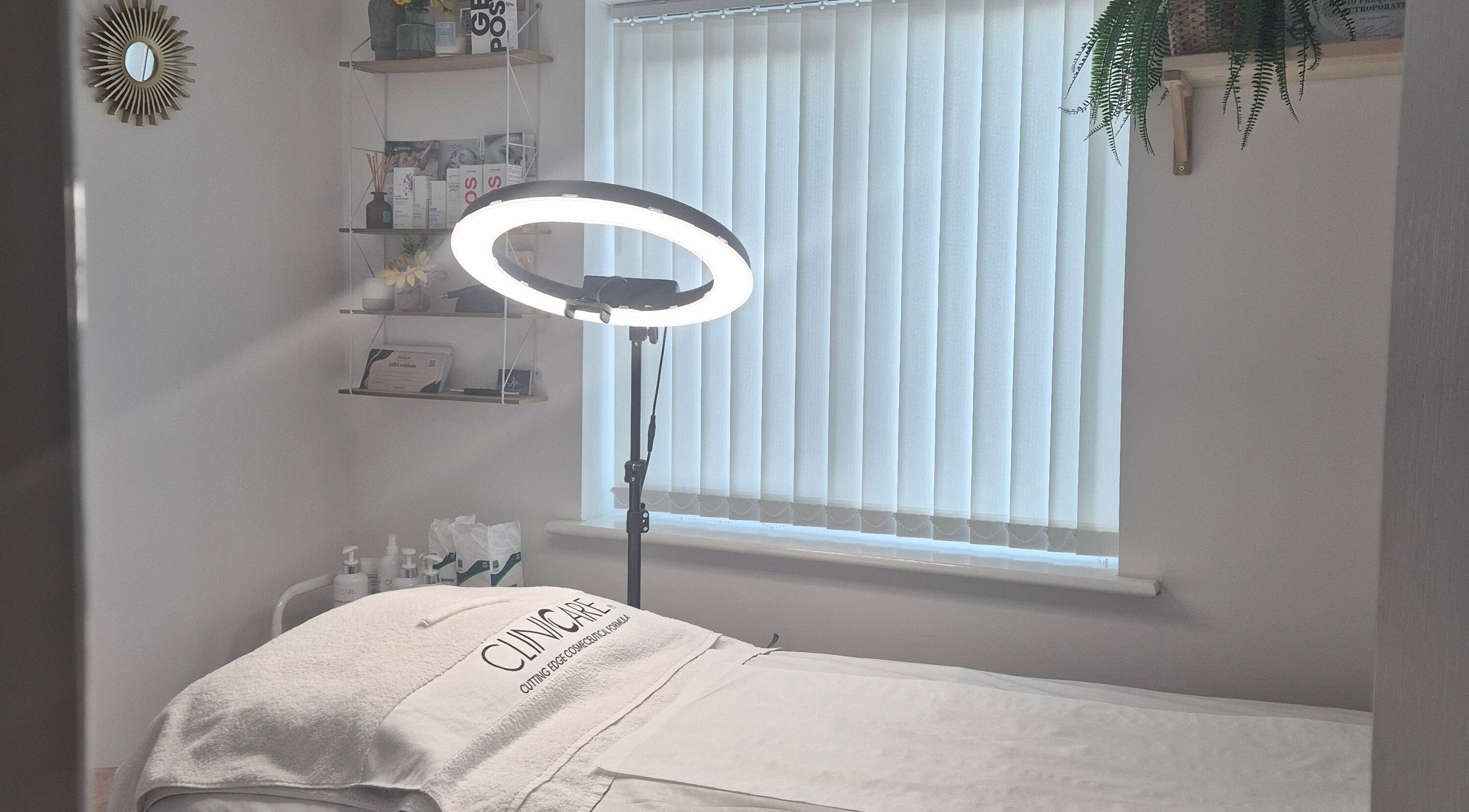 Serene therapy room at Julia Plas Skin Alsager featuring soft lighting and modern decor in Stoke-on-Trent, England, GB.