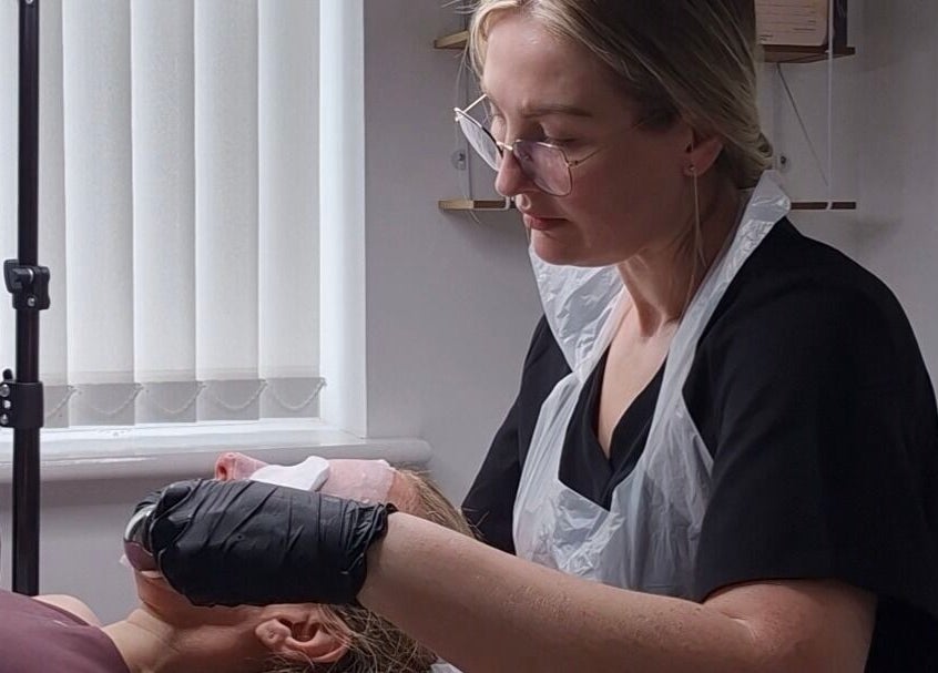 Aesthetician treats client at Julia Plas Skin Alsager, Stoke-on-Trent, England, GB.