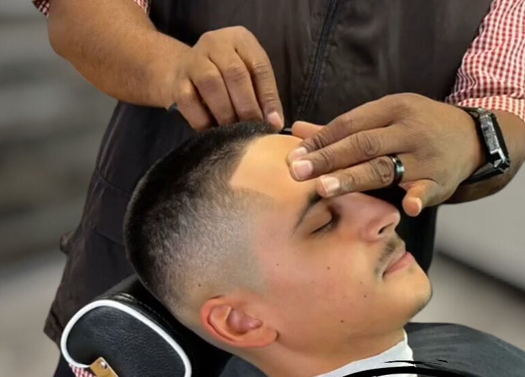 Close-up of grooming service at The Introvert Men's Grooming Lounge, Chandler, Arizona, US enhancing customer relaxation.