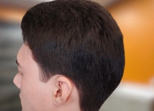 Close-up of a sleek men's haircut at The Introvert Men's Grooming Lounge in Chandler, Arizona, US.