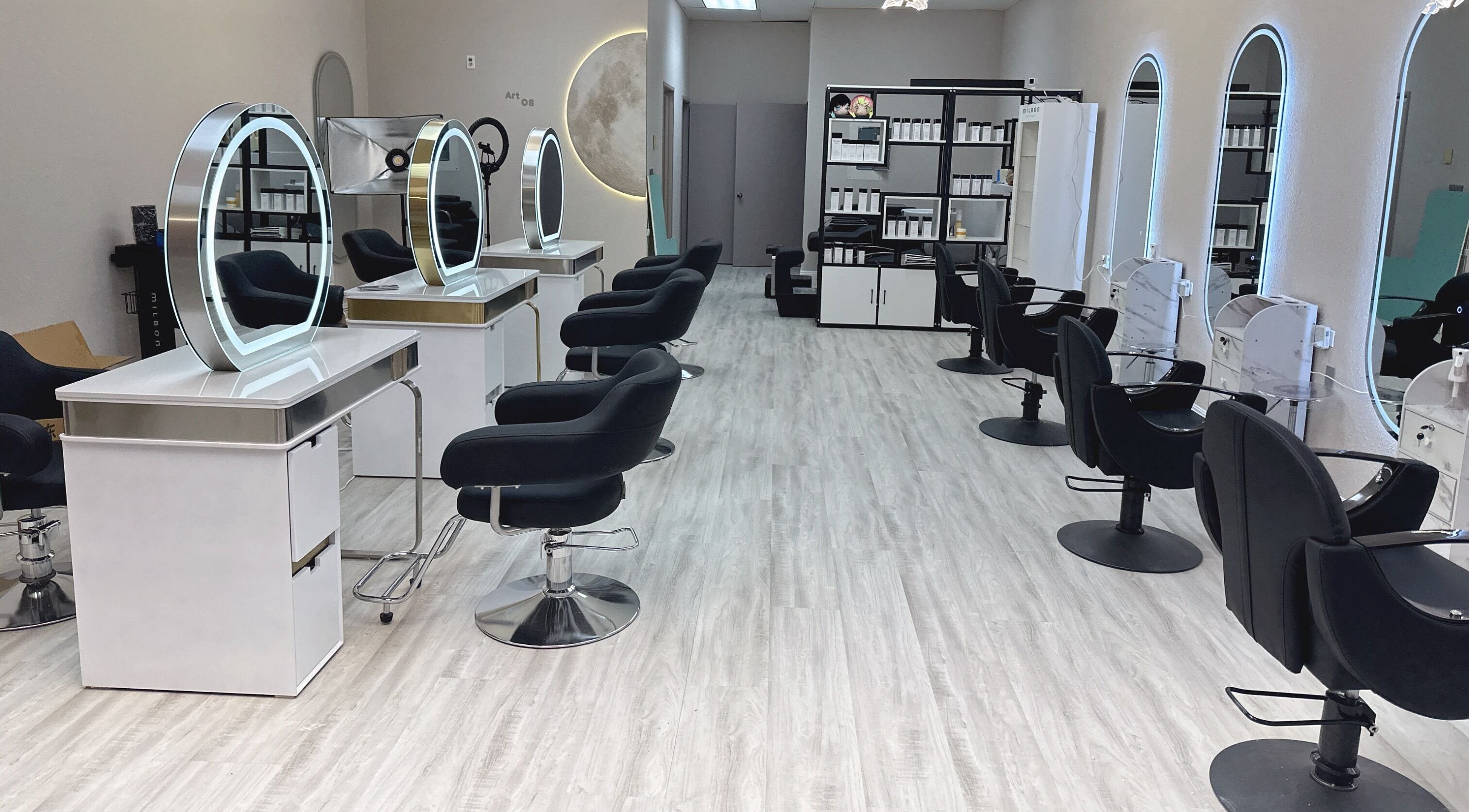 Spacious, modern salon interior at Art OS Hair Salon, San Gabriel, California, US, featuring chic styling stations.