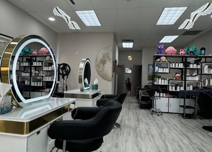 Interior of Art OS Hair Salon in San Gabriel, California, US, featuring modern styling stations and decor.