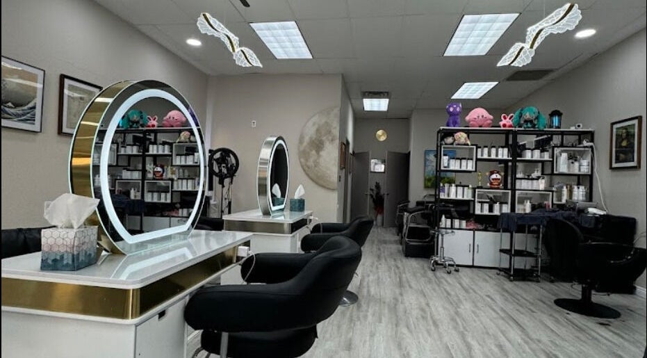 Interior of Art OS Hair Salon in San Gabriel, California, US, featuring modern styling stations and decor.
