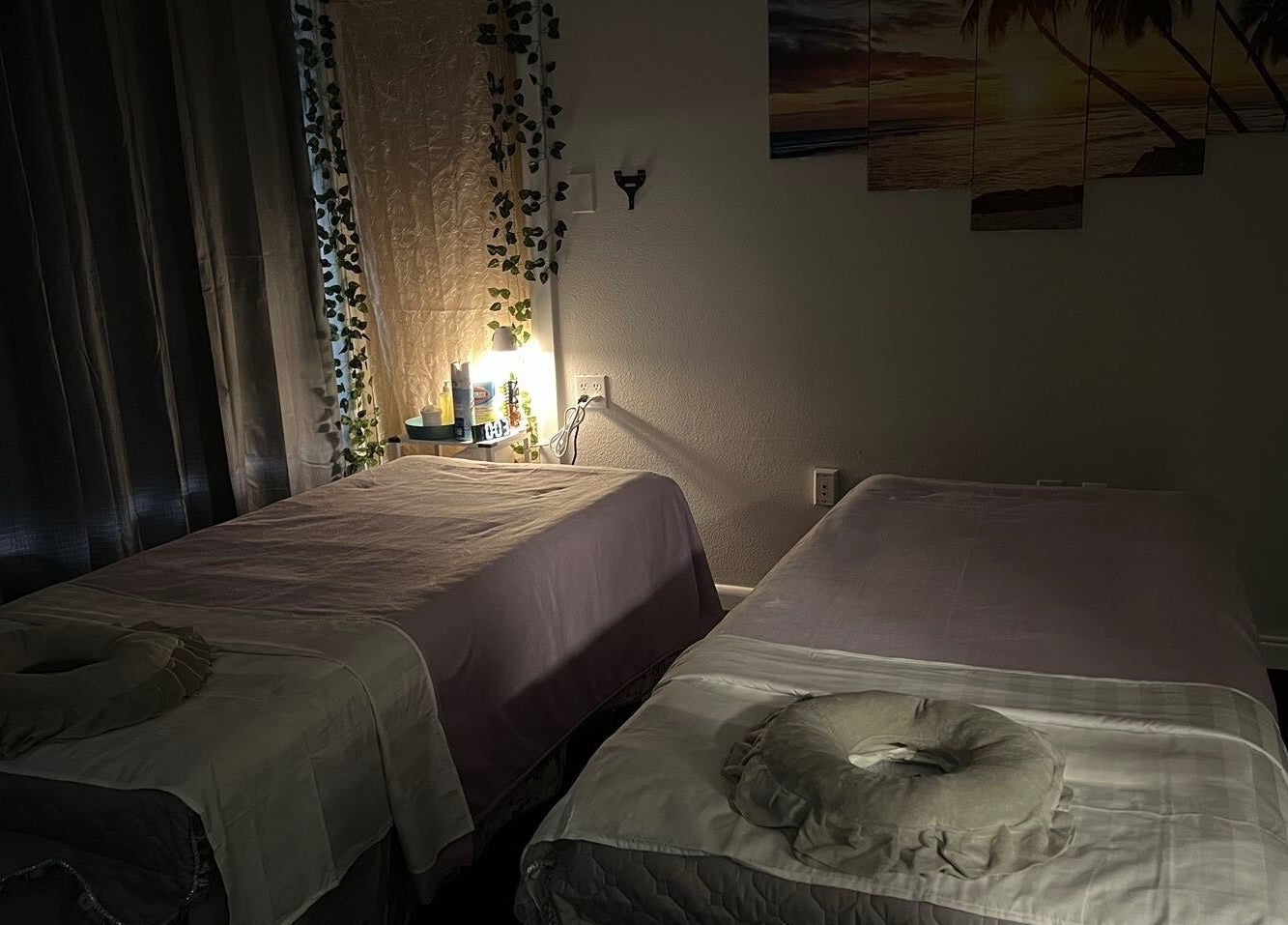 Cozy massage beds at ZY Massage Spa, Sarasota, Florida, US, offer a tranquil retreat.