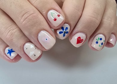Custom nail art at Nash & Co Nails, Narangba, Queensland, AU featuring vibrant designs on smooth, manicured nails.