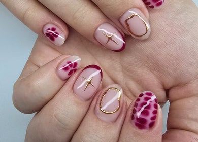 Stylish maroon and gold nail art at Nash & Co Nails, Narangba, Queensland, AU.