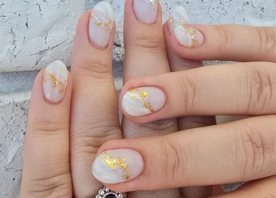 Stunning marble nails with gold accents at Nash & Co Nails, Narangba, Queensland, AU.