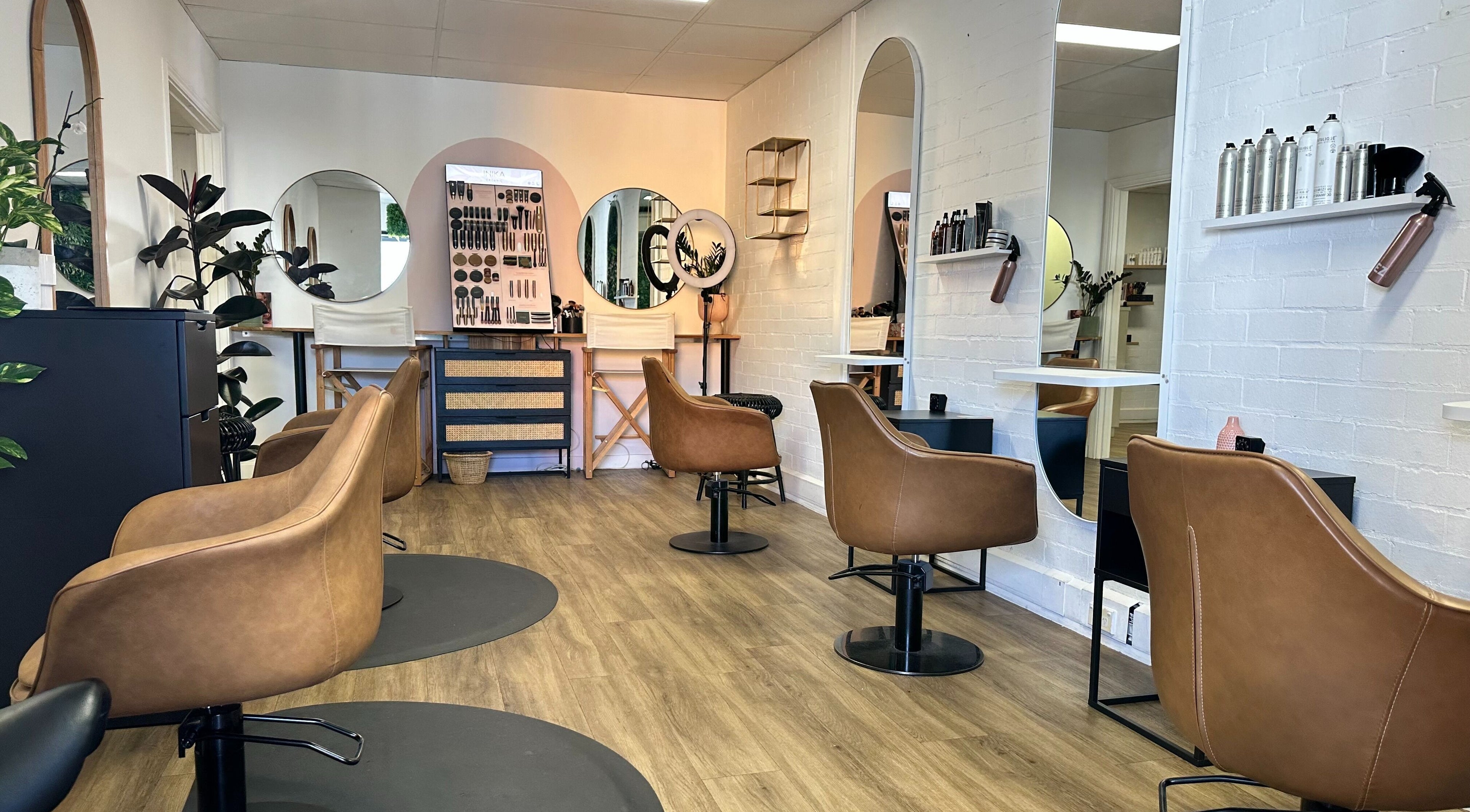 Elegant salon interior at Astair Organic Hair & Make-Up Dunsborough, Dunsborough, Western Australia, AU with stylish seating.