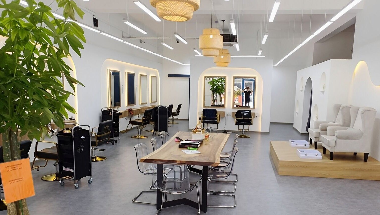 Interior of Serahair By Seoul Korea Salon, Johor Bahru, with stylish chairs and modern decor.