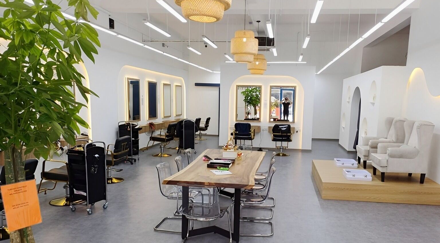 Interior of Serahair By Seoul Korea Salon, Johor Bahru, with stylish chairs and modern decor.