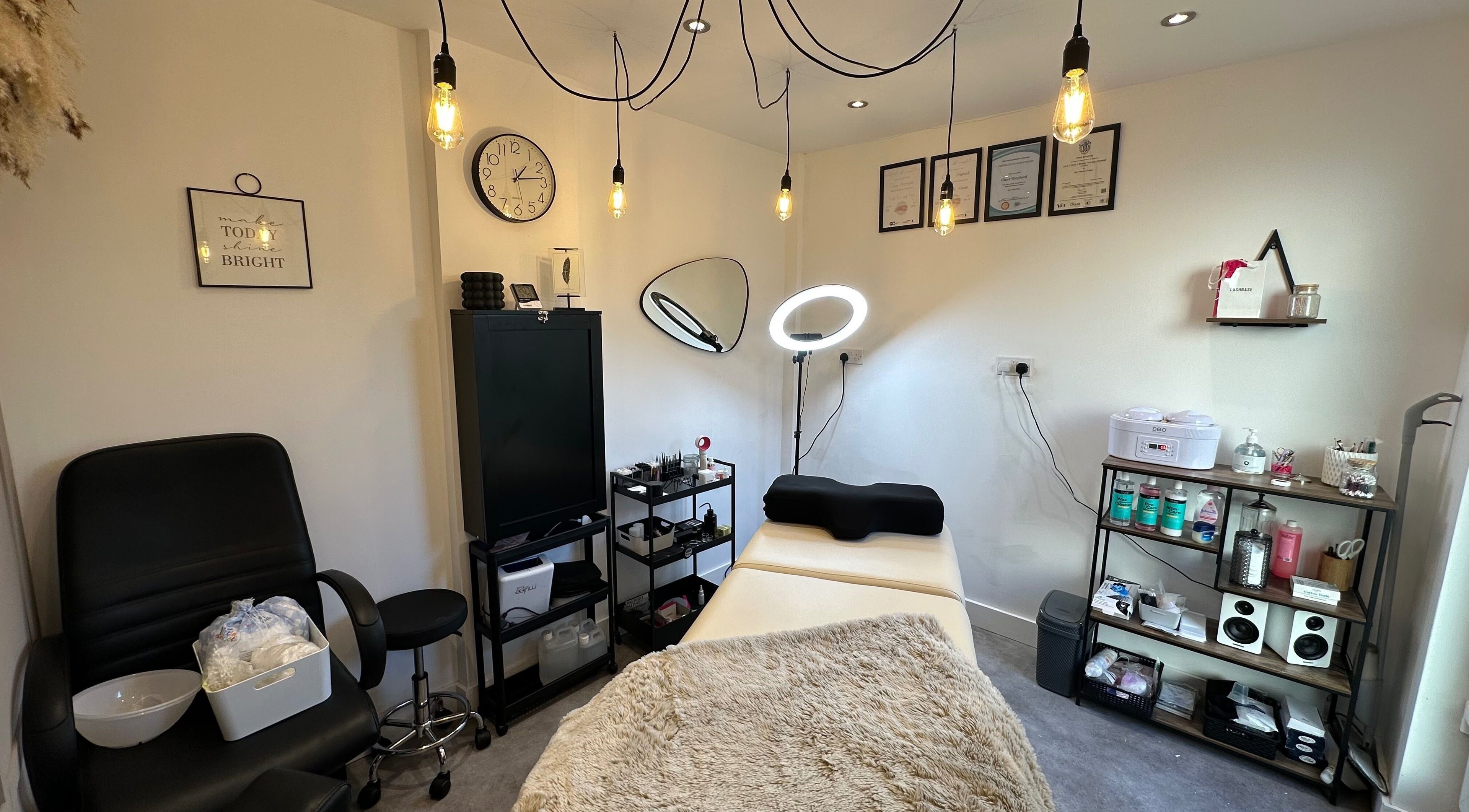 Lumi Lashes and Beauty spa room in Middlewich, England, GB with modern decor and comfortable treatment bed.