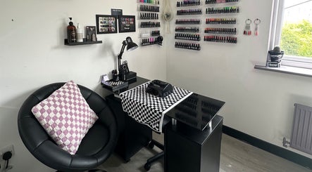 Chic nail station at Savage Skin and Beauty, Stockton-on-tees, England with polish display and sleek decor.
