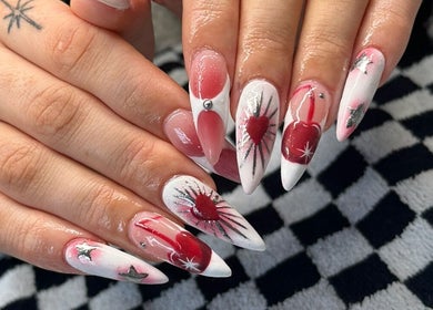 Stylish heart-themed nail art at Savage Skin and Beauty, Stockton-on-tees, England, GB.