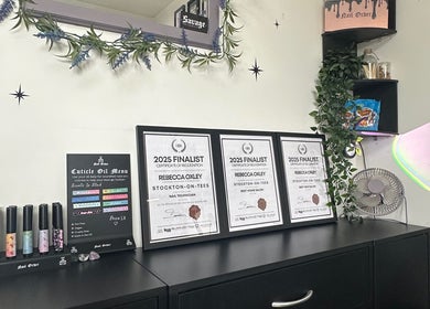 Award-winning display of certificates at Savage Skin and Beauty, Stockton-on-Tees, England, GB.