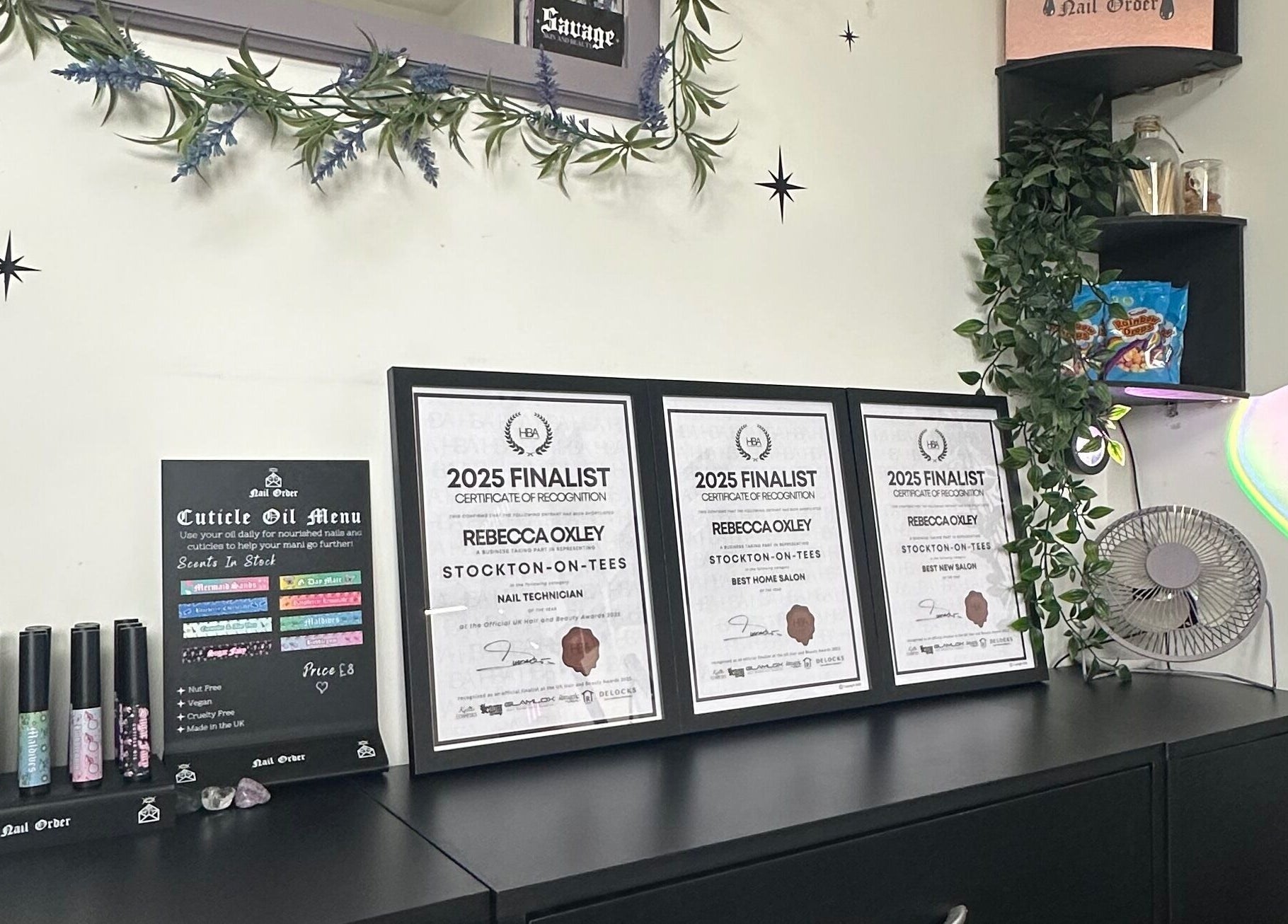 Award certificates at Savage Skin and Beauty, Stockton-on-tees, England, highlighting 2025 finalist achievements.