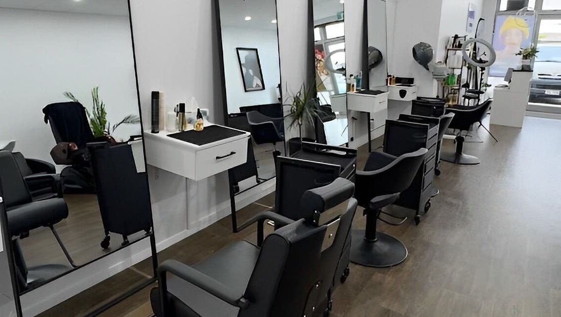 Modern styling chairs and mirrors at Glam Plus Hair & Beauty Salon, Auckland, Auckland, NZ.
