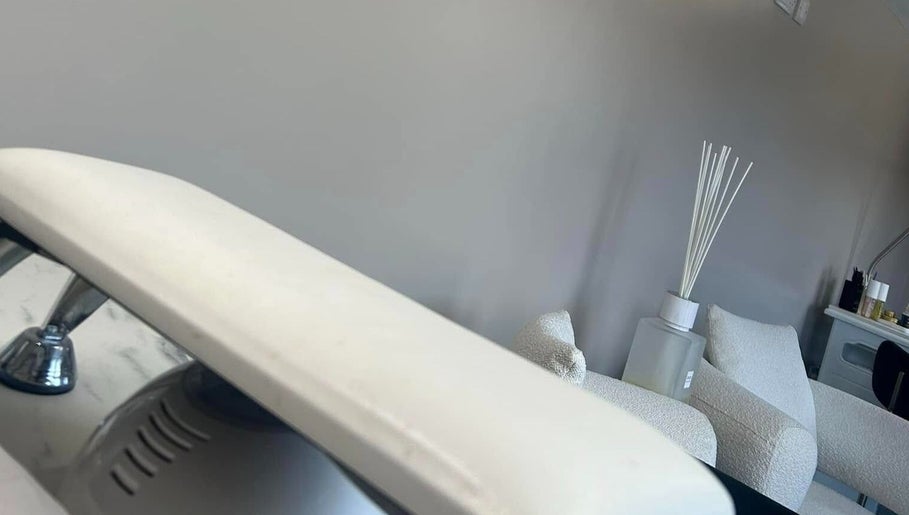 Modern seating and decor at Nails by Aims Xo, Bolsover, England, GB, showcasing elegant salon ambiance.