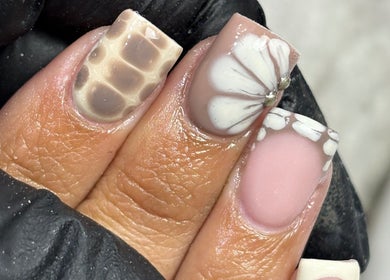 Elegant nail art with floral patterns at Nails by Aims Xo, Bolsover, England, GB.