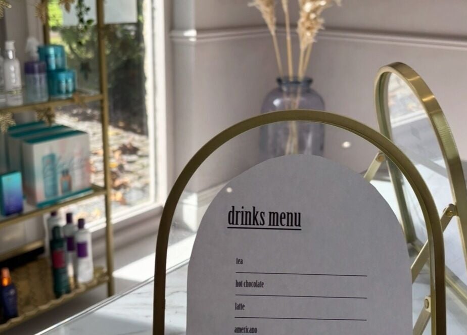 Drinks menu and products at Secret Salon, Pucklechurch, England, GB. Inviting atmosphere and luxury care.