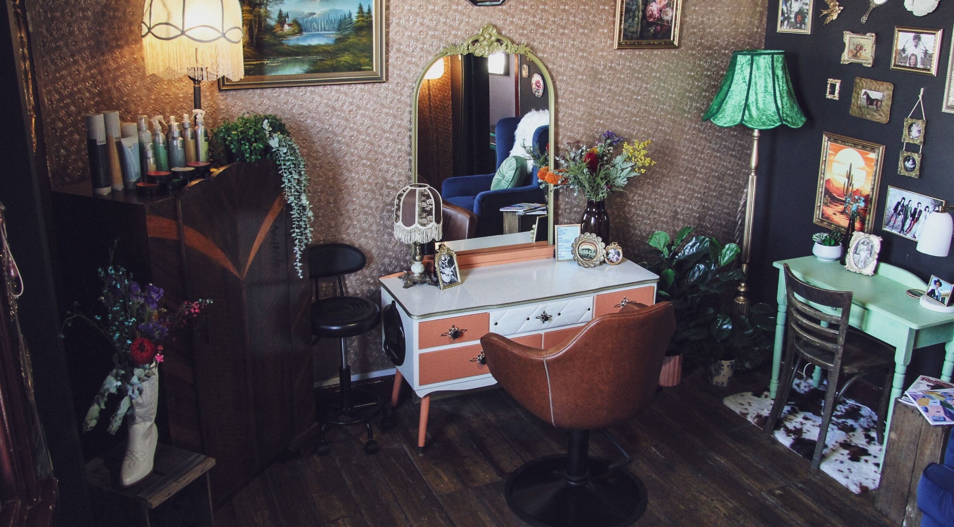 Chic vintage salon corner at Oh Darlin' Hair Studio, Melbourne, Victoria, AU, highlighting unique decor and style.