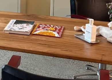 Tabletop at Salon Spaghetti, Melbourne, Victoria, AU with decor and books.