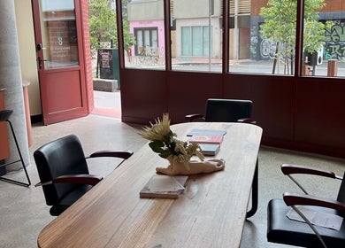 Chic meeting area at Salon Spaghetti, Melbourne, Victoria, AU, with stylish chairs and natural light.