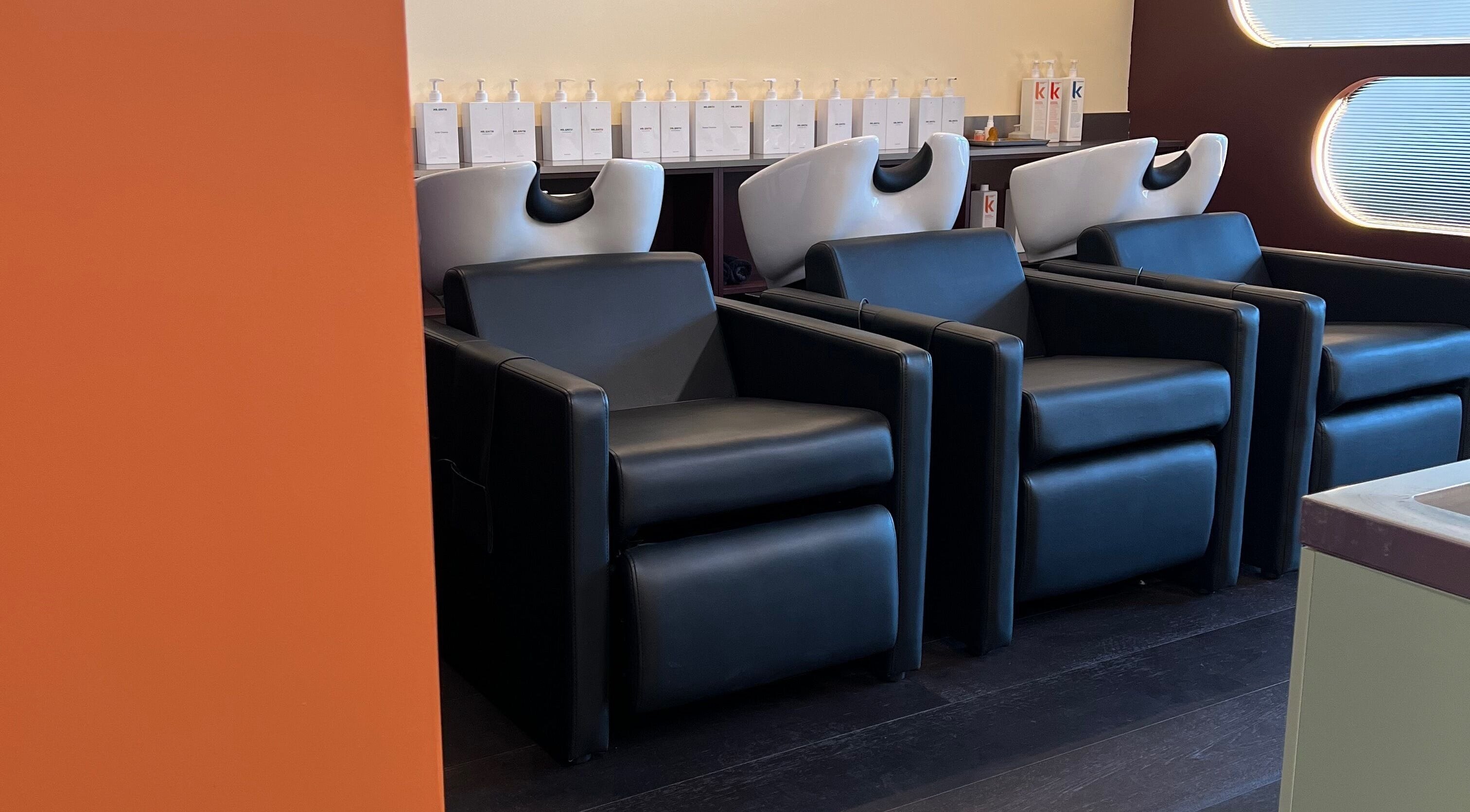 Stylish washstations at Salon Spaghetti in Melbourne, Victoria, AU offer a sleek and comfortable experience.